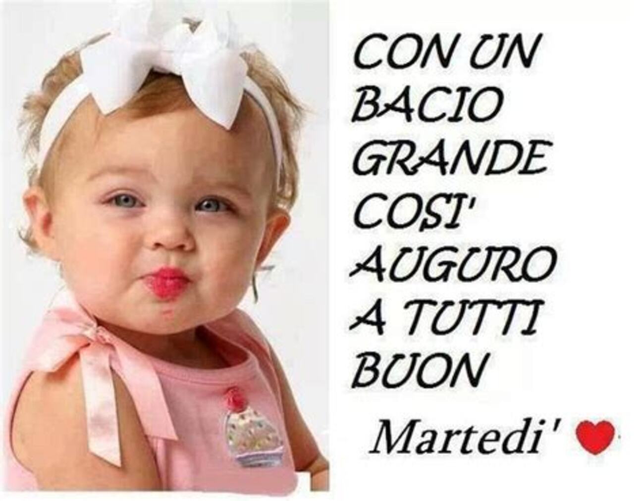 Con un bacio grande così auguro a tutti buon martedì